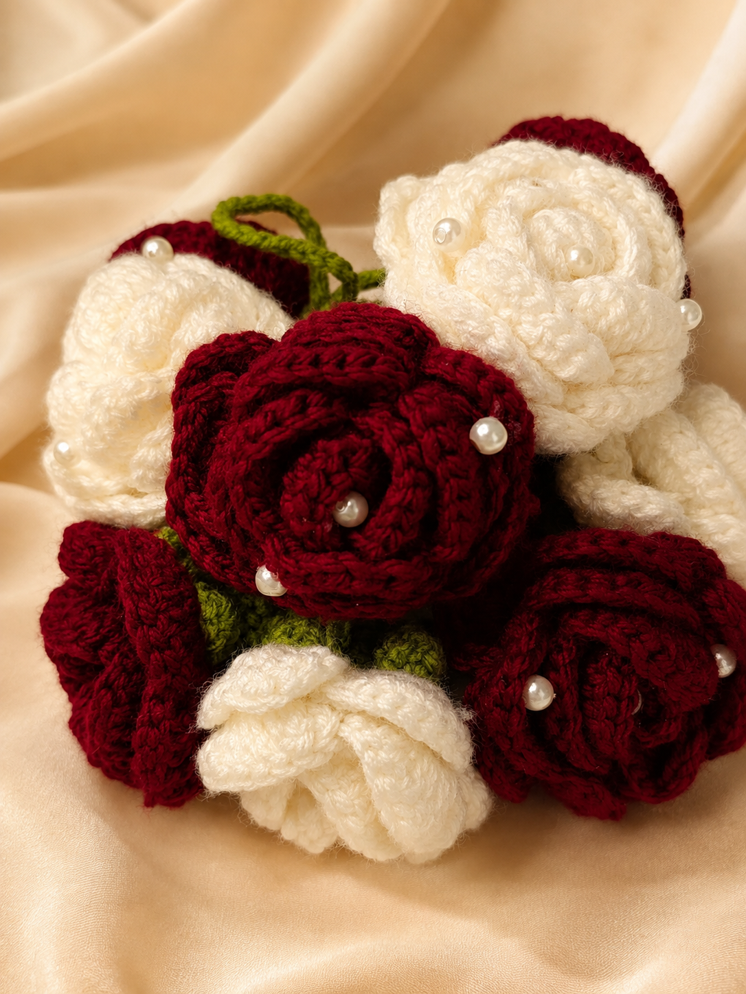 Handmade crochet flower gajra with maroon and ivory roses by Yarnbloompk