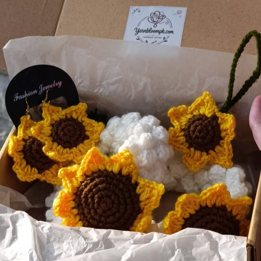 Handmade crochet Sunflower Bloom Box with two crochet sunflower gajras, sunflower keychain and sunflower earrings
