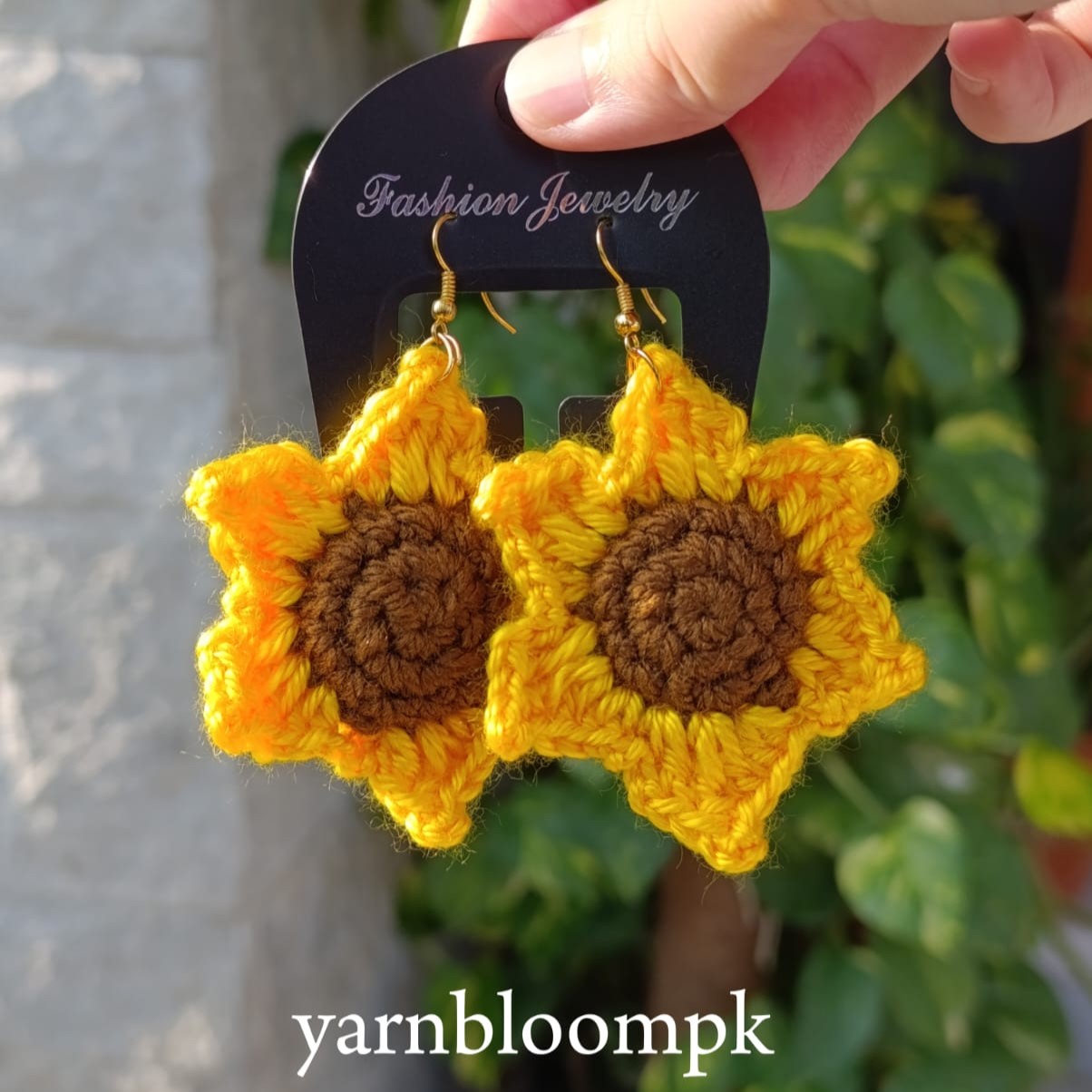 Handmade sunflower earrings included in crochet gift box